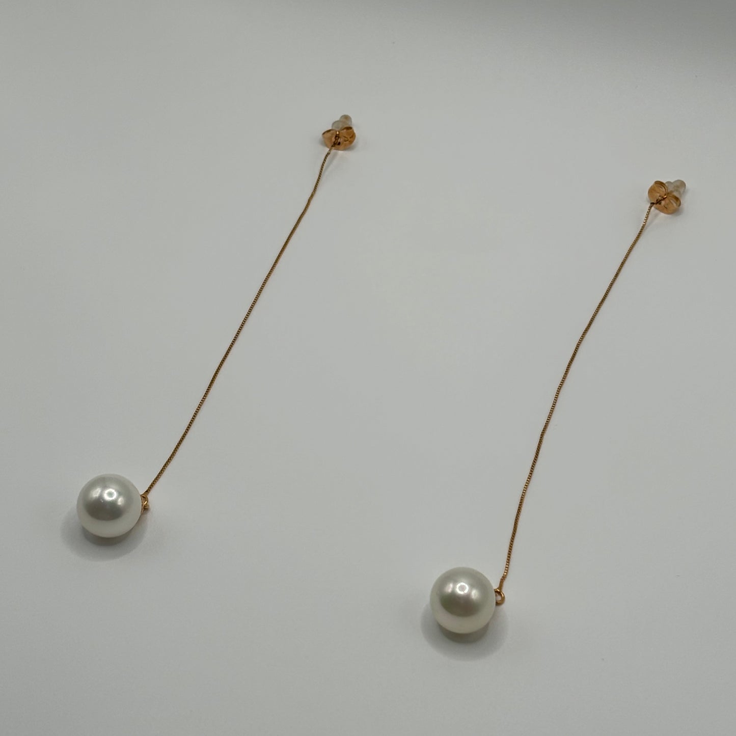 Solitary Luster: The Single Pearl Drop Earrings