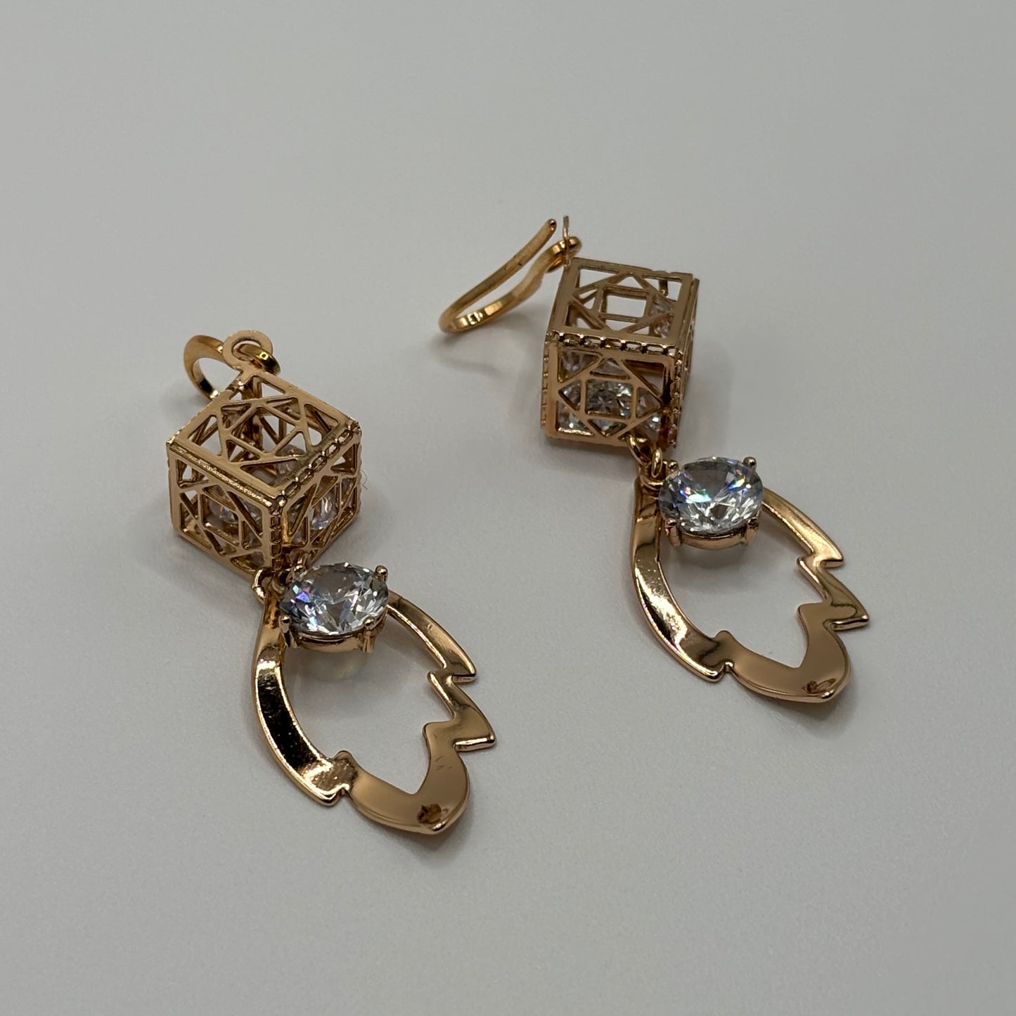 Geometric Glamour: The Gilded Cage Crystal Earrings