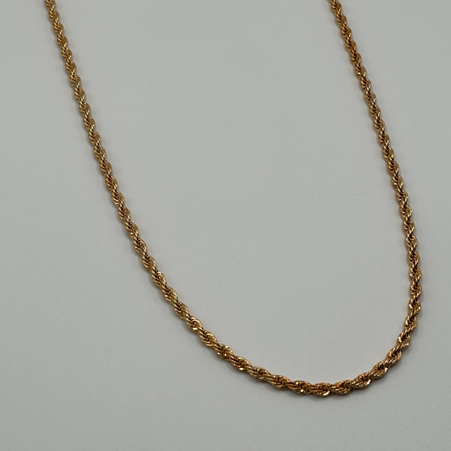 Entwined Radiance: The Twisted Rope Chain Necklace