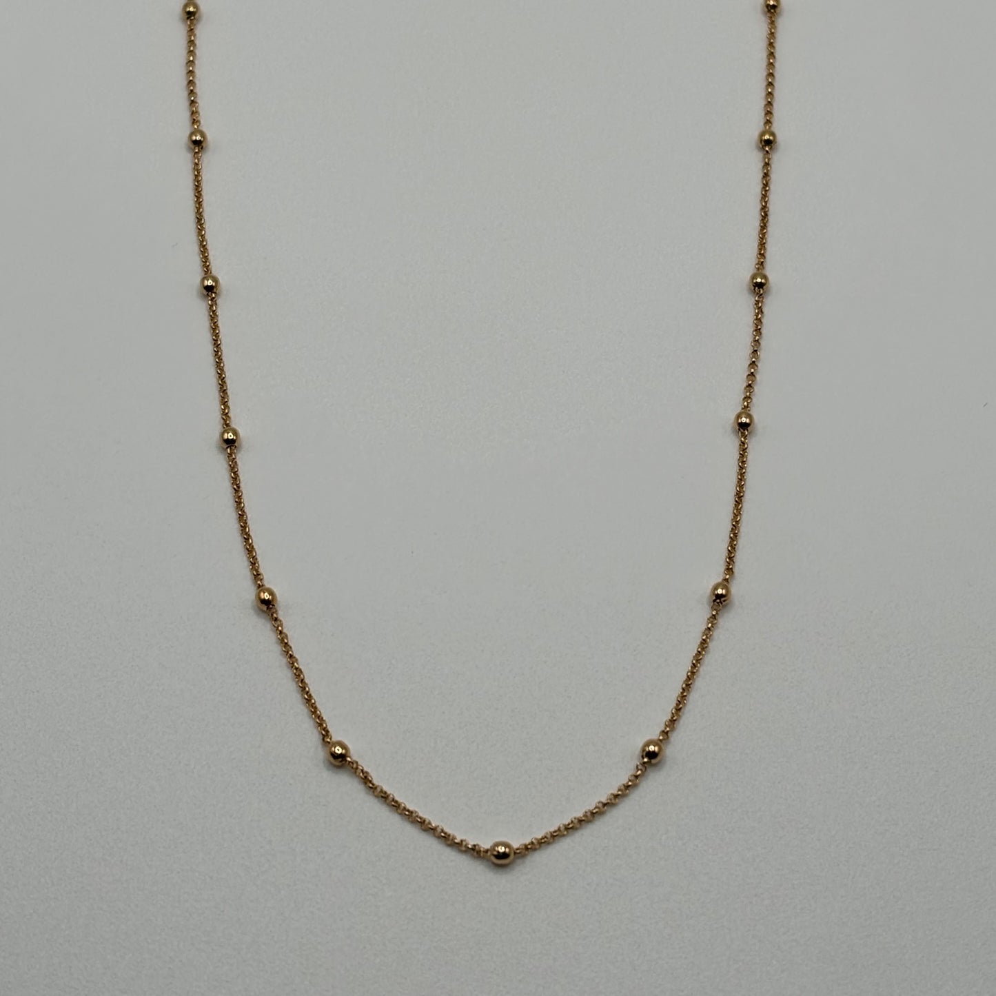 Golden Constellation: The Beaded Satellite Chain Necklace