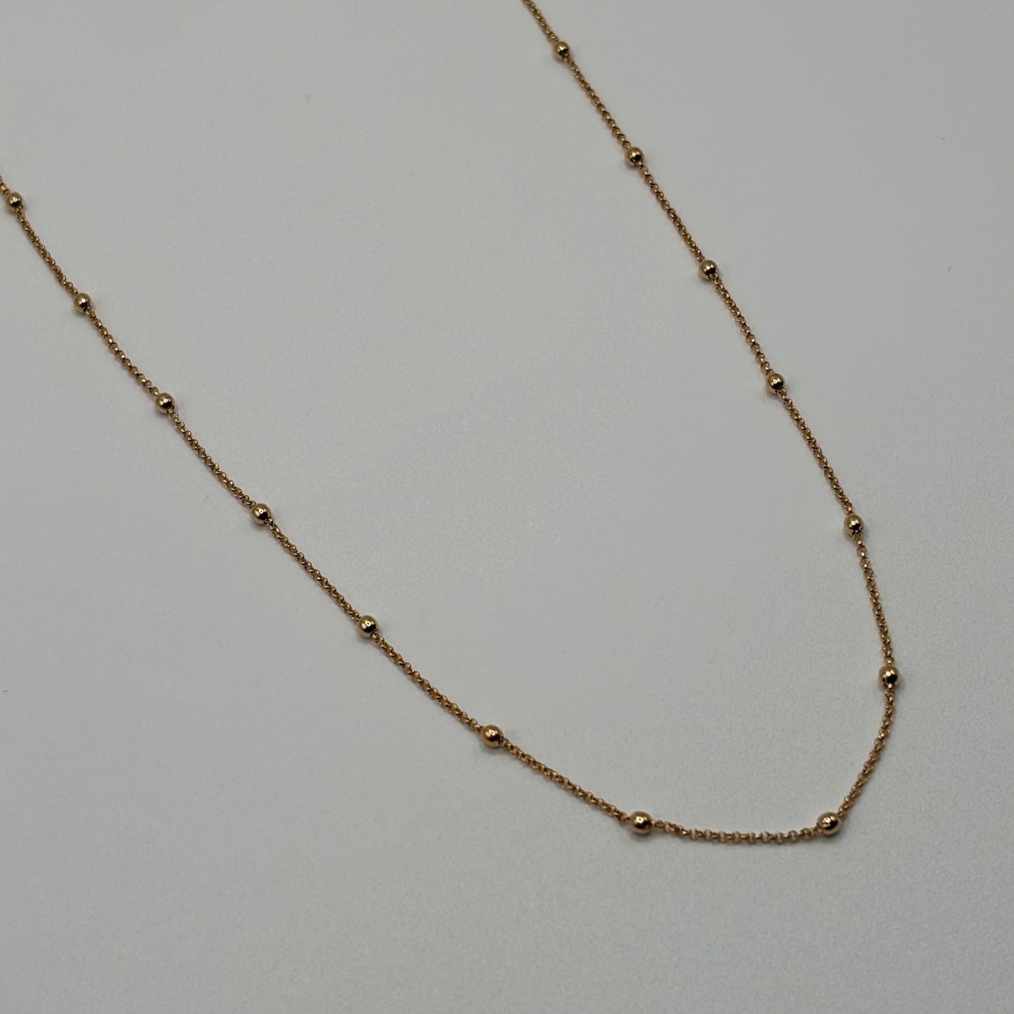 Golden Constellation: The Beaded Satellite Chain Necklace