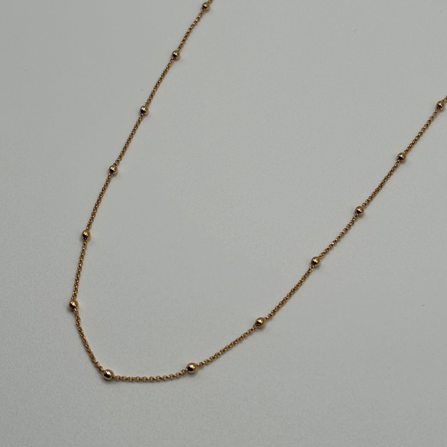 Golden Constellation: The Beaded Satellite Chain Necklace